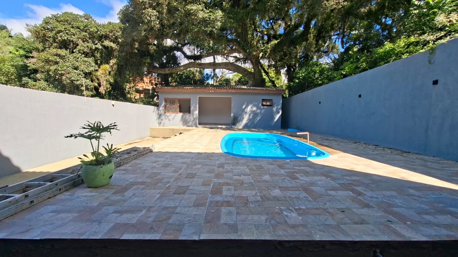 Imagem Casa impecável com suíte, piscina e espaço gourmet no Dom Feliciano - Centro de Viamão!