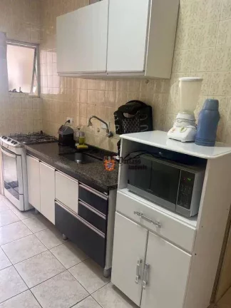 Imagem Apartamento com 3 dormitórios à venda, 117 m² por R$ 430.000 - Pitangueiras - Guarujá/SP
