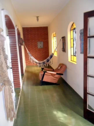 Imagem CASA EM DOIS LOTES - LADO LINHA - PISCINA