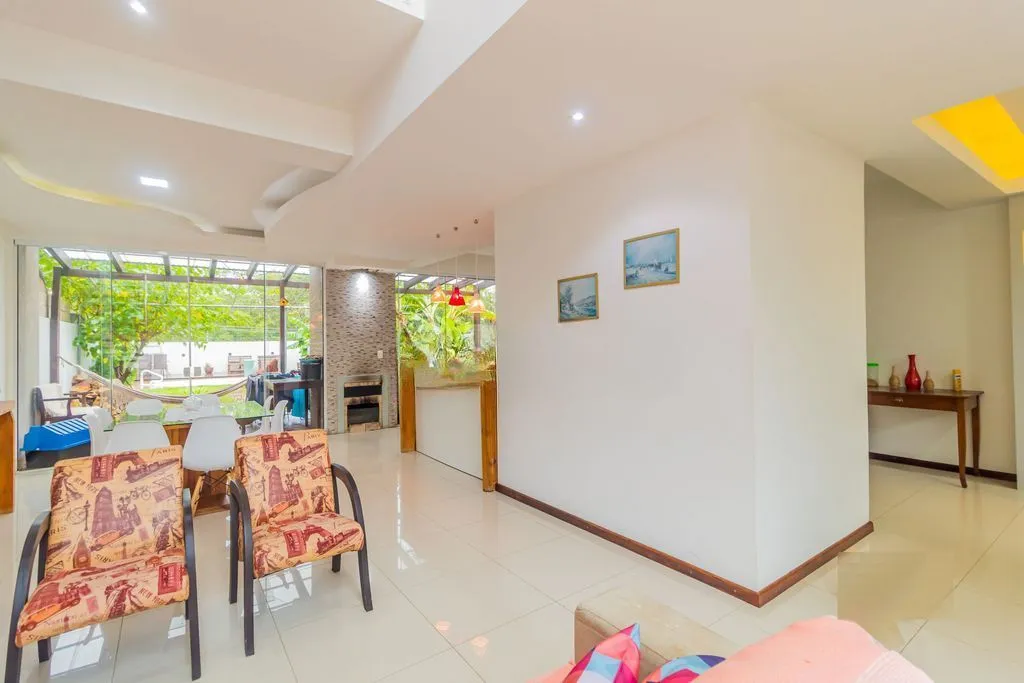Imagem Casa em Condomínio 3 dorms à venda Avenida Juca Batista, Hípica - Porto Alegre