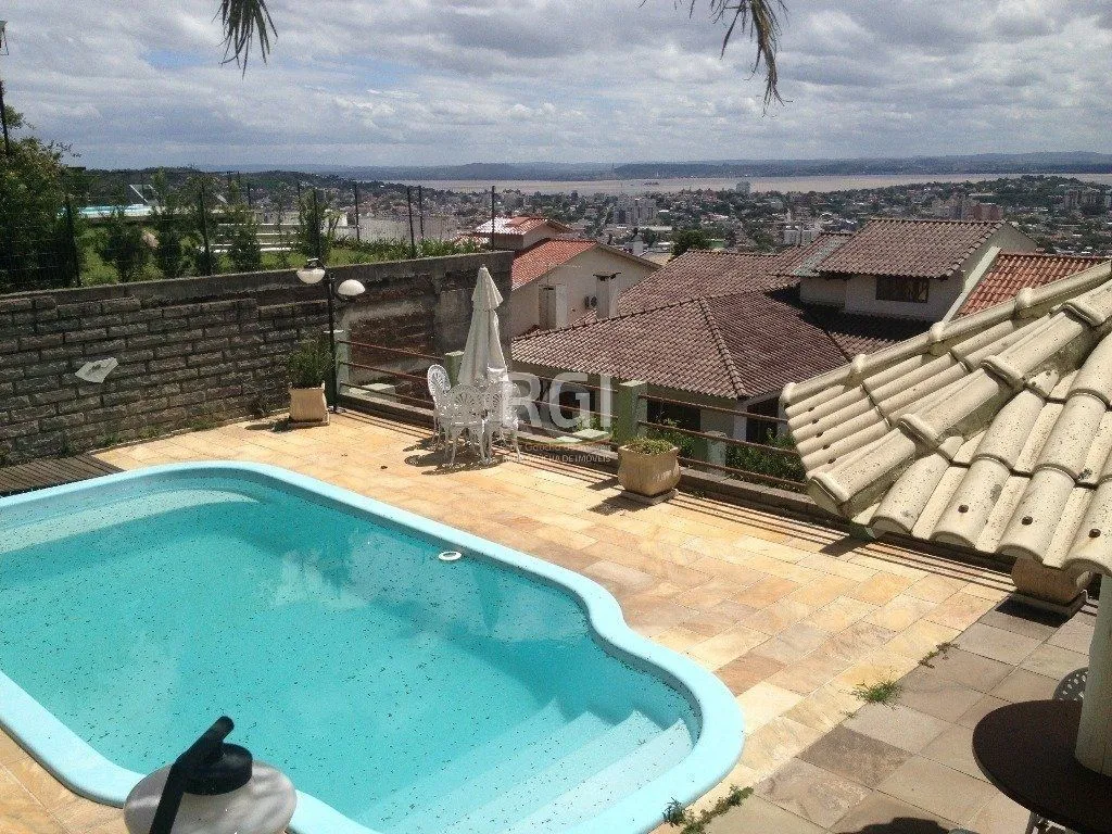 Imagem Casa Condominio para Venda - 350m², 4 dormitórios, sendo 1 suites, 2 vagas - Nonoai