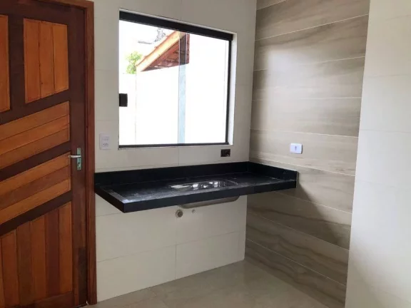 Imagem Sobrado com 2 dormitórios à venda, 60 m² por R$ 390.000,00 - Caiçara - Praia Grande/SP