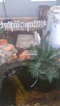 Imagem Casa de 3 quartos com piscina aquecida e energia fotovoltaica no Condomínio Vanice Andrade, no bairro Vila Arquelau.