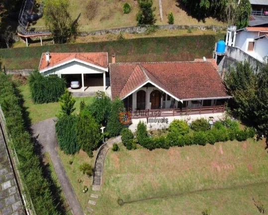Foto do imóvel Casa com 3 dormitórios à venda, 235 m² por R$ 1.250.000,00 - Alto Do Capivari - Campos do Jordão/SP