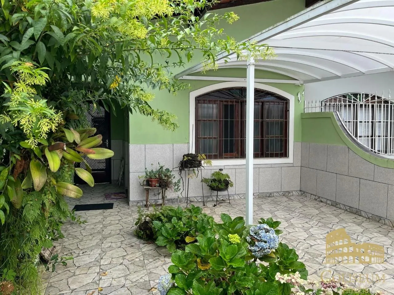 Foto do imóvel Casa com 2 dormitórios à venda, 84 m² por R$ 410.000 - Balneário Flórida - Praia Grande/SP