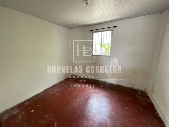 Imagem Oportunidade! Terreno + 3 Casas Prontas para Morar ou Alugar