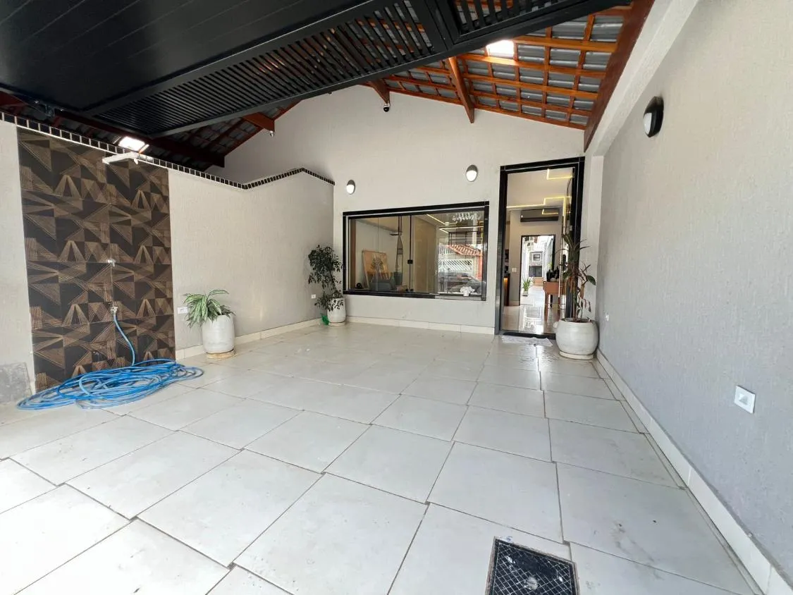 Foto do imóvel CASA NOVA COM 3 DORMITÓRIOS SENDO 2 SUÍTES E ÁREA GOURMET COM OFURO À VENDA NO VILAMAR PRAIA GRANDE