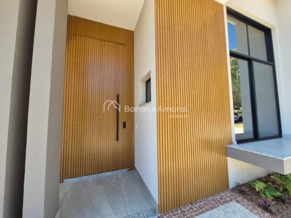 Imagem Casa moderna e sofisticada à venda em condomínio com segurança 24 horas, ideal para quem busca co...