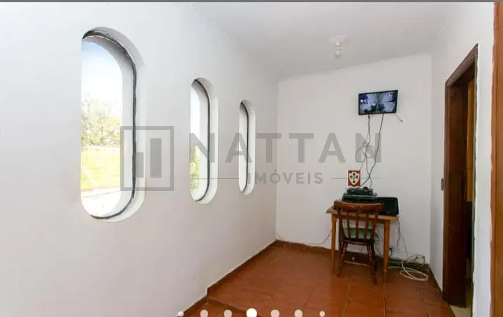 Imagem Casa à venda com 3 dormitórios, 4 banheiros, salão de festas e terreno de 208 m²
