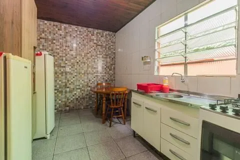 Imagem Casa 2 dorms à venda Avenida Outeiro, Coronel Aparício Borges - Porto Alegre