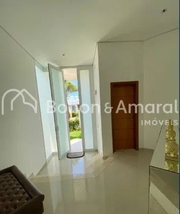 Imagem Casa de Condomínio com 4 Quartos e 6 banheiros à Venda, 481 m² por R$ 3.900.000