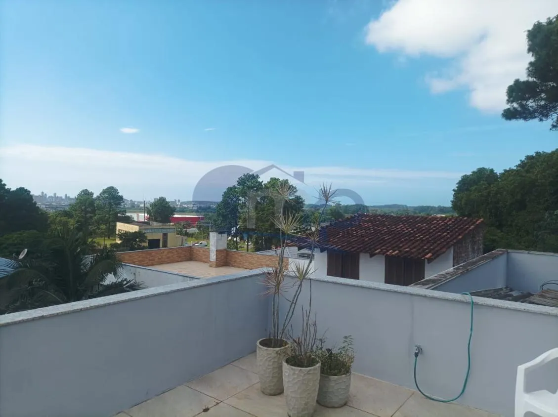 Imagem Casa de alto padrão á venda com 4 suites no bairro Centenário em Torres/RS