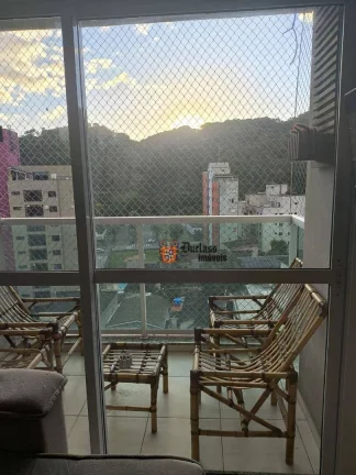 Imagem Apartamento com 2 dormitórios à venda, 60 m² por R$ 420.000 - Praia da Enseada - Guarujá/SP