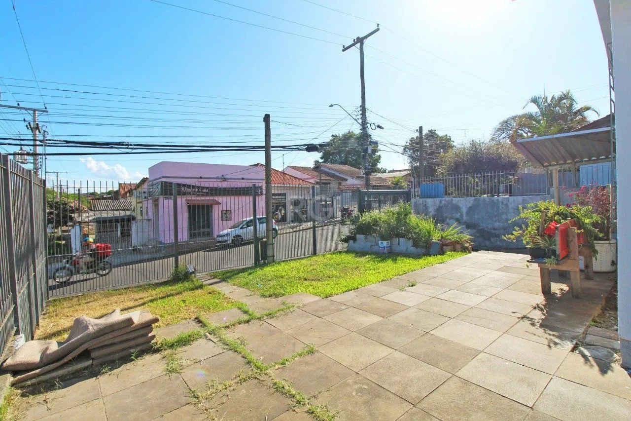 Imagem Casa 5 dormitórios, 1 suíte, 2 vagas de garagem, no bairro Camaquã, Poa/RS.