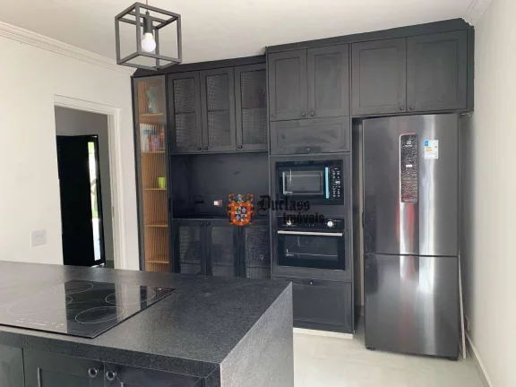 Imagem Sobrado com 3 dormitórios à venda, 179 m² por R$ 1.280.000,00 - Balneário Praia do Pernambuco - Guarujá/SP