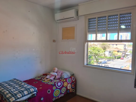 Imagem Belíssimo apartamento bem espaçoso em Santos na Aparecida com 2 dormitórios mais dependência, uma suíte e garagem fechada a venda por R$ 480.000,00