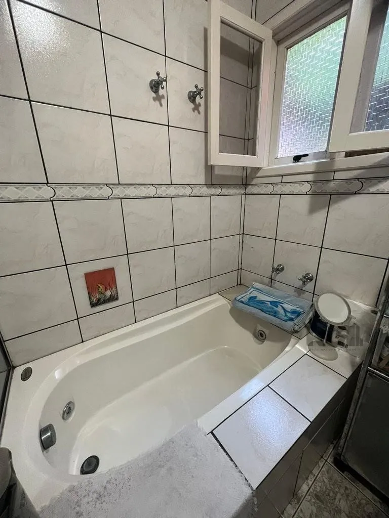Imagem Casa com 4 quartos, suíte, churrasqueira, vaga de garagem, no bairro Elsa, Viamão/RS