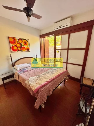 Imagem Casa de luxo à venda em Caraguatatuba-SP, bairro Martim de Sá: 4 quartos, 2 suítes, 2 salas, 3 banheiros, 3 vagas de garagem, 249m².