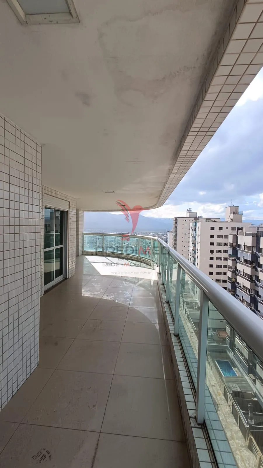 Imagem Apartamento com varandão novo de 3 Suites á venda com vista mar no Tupi, Praia Grande