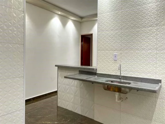 Imagem Casa com 2 dormitórios à venda, 130 m² por R$ 400.000 - Caiçara - Praia Grande/SP