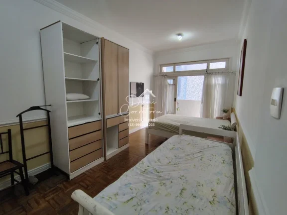 Imagem Apartamento frente mar com linda vista lateral de 2 Quartos em Pitangueiras, Guarujá-SP: 2 Salas, 2 Banheiros, 1 Vaga de Garagem, 75m².