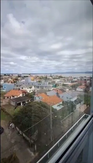 Imagem Apartamento, 2 dormitórios, 1 vaga coberto, churrasqueira no centro de Tramandaí
