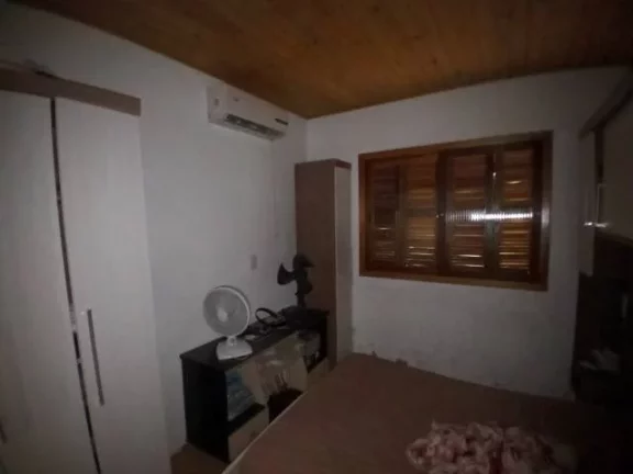Imagem Sítio com Casa em condomínio Fechado, Próximo da portaria, junto a RS040