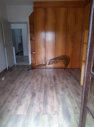 Imagem Casa para venda em São Vicente, 3 dormitórios.