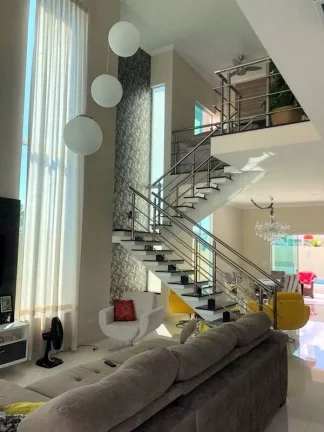 Imagem BELISSIMO SOBRADO EM CONDOMINIO FECHADO COM 5 SUITES