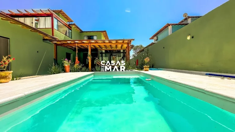 Imagem Casa moderna em condomínio à venda em Búzios-RJ, 3 suítes, 4 banheiros, 2 vagas, 250m² na Baía Formosa. Aproveite!