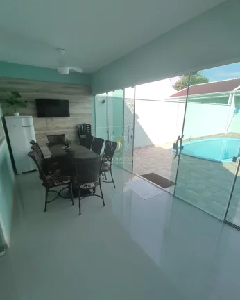 Imagem Casa com piscina para Venda em Guaratuba, 50m do mar, ótimo terreno, bem localizado!