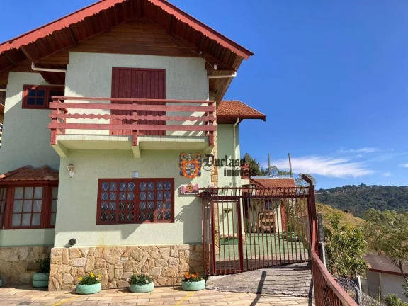 Imagem Sobrado com 4 dormitórios à venda, 259 m² por R$ 1.200.000,00 - Jardim Guararema - Campos do Jordão/SP