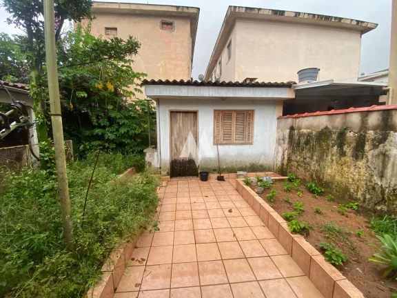 Imagem Casa à venda com 3 dormitórios e edícula no bairro Aparecida de Santos/SP