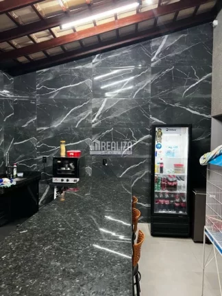 Imagem Casa à venda no Jardim Espanha, Uberaba | 2 dormitórios, suíte, piscina e varanda gourmet
