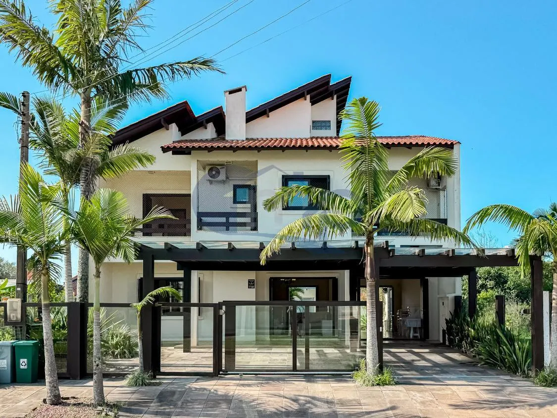 Casa a venda com 4 dormitorios na Paraiso em Torres/RS
