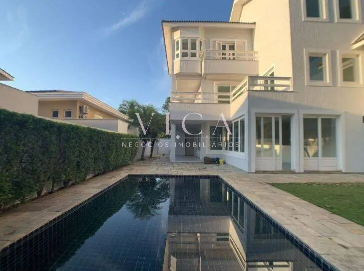 Imagem Alphaville 10 | Casa 600m² 4 suítes, lareira e 6 vagas | R$ 4,2 mi
