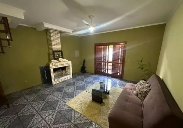 Imagem Ótima casa no bairro Jardim Lindóia, com 4 quartos, pátio amplo e área com churrasqueira