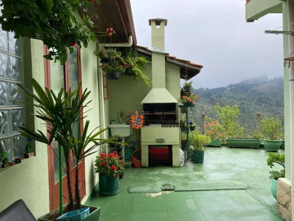 Imagem Sobrado com 4 dormitórios à venda, 259 m² por R$ 1.200.000,00 - Jardim Guararema - Campos do Jordão/SP