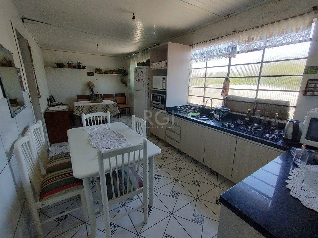 Imagem Casa para Venda - 100m², 3 dormitórios, 2 vagas - Lomba do Pinheiro
