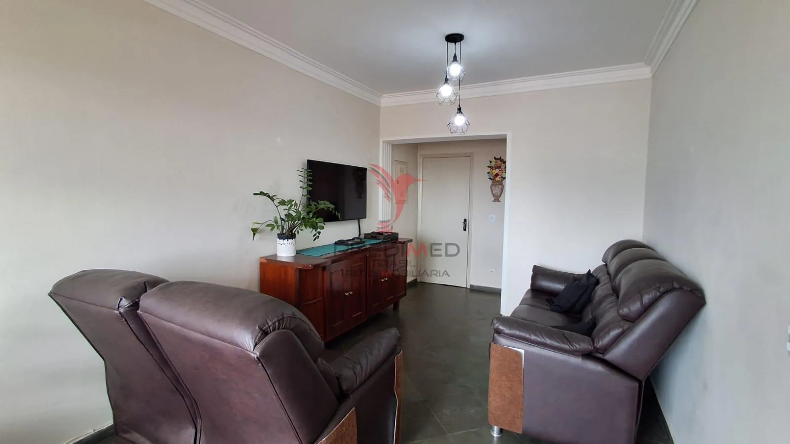 Imagem Vendo Apartamento Espaçoso na Vila Monteiro com 2 banheiros e garagem coberta