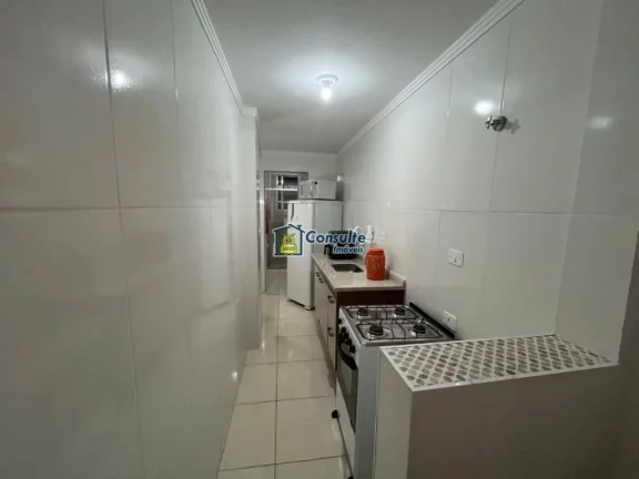 Imagem "Viva a experiência de morar pertinho da areia, em um apartamento aconchegante de 1 dormitório, porteira fechada, situado a poucos passos da praia, com uma vista lateral encantadora do mar que torna cada dia mais especial." Por apenas R$ 270.000,00. Agend