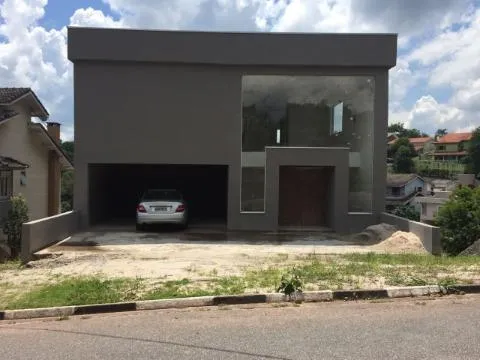 Imagem VENDA DE SOBRADO EM CONSTRUÇÃO NO CONDOMÍNIO JARIDM IMPERIAL HILLS III, EM ARUJÁ/SP, 500m² com 4 suítes, piscina, churrasqueira e 6 vagas CONSULTE-NOS