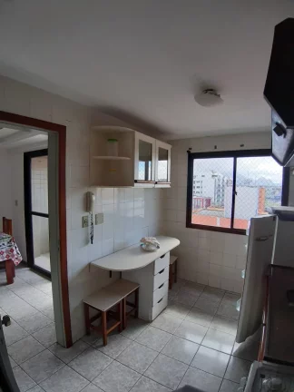 Imagem Apartamento composto de 2 Quartos (1Suíte) Sala de jantar e Estar uma Varandas Cozinha Área de Serviço 1 Vaga de Garagem.