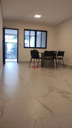 Imagem Sobrados na Guilhermina Esperança com 2 dorms, 1 suites 1 lavabo, vaga para 2 carros, sacadas nos quartos principais, churrasqueira.
