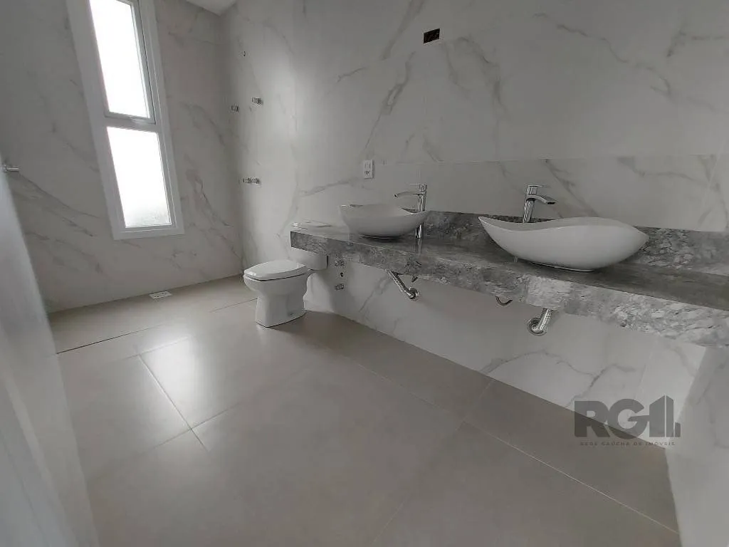 Imagem Casa de Condomínio em Atlântida Sul