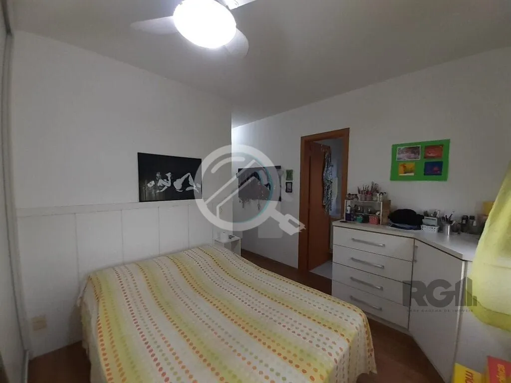 Imagem Apartamento de dois dormitórios sendo um suíte, living dois ambientes com churrasqueira, cozinha e...