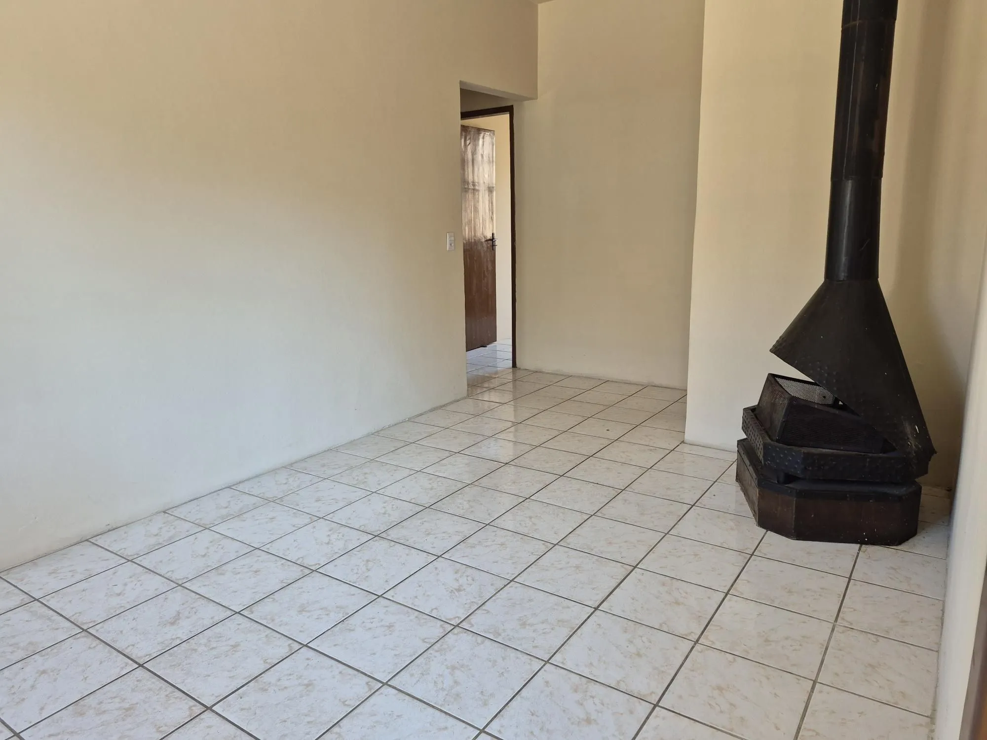Imagem Casa Residencial de 4 Quartos com Piscina e Churrasqueira em Porto Alegre
