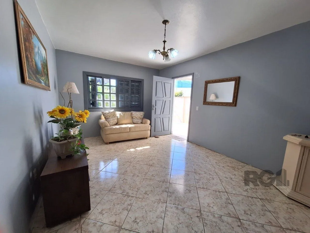 Imagem Casa com 3 dormitórios, suíte, lareira, Jardim Algarve em Alvorada - RS.