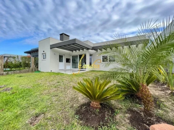 Imagem Excelente Casa no Condomínio Riviera Estilo contemporânea! Composta por 4 suítes, sendo 2 americanas,