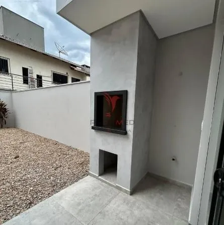 Imagem Sobrado Alto Padrão com 2 Suites, área externa ,churrasqueira no Amizade. Jaguará do Sul